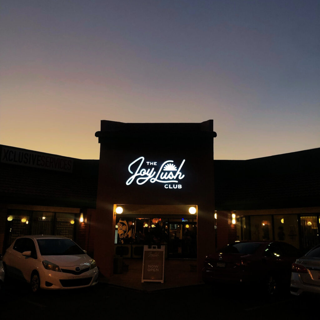 Business signage Phoenix Joy Lush Club storefront signs Arizona Rising Sign